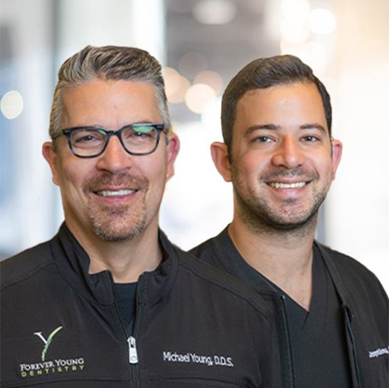 Doctor Samona and Doctor Young smiling