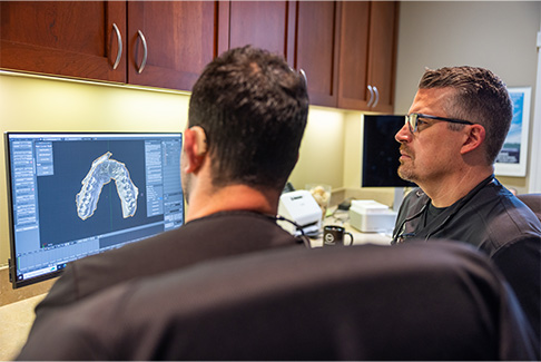 Dentist treating dental patient