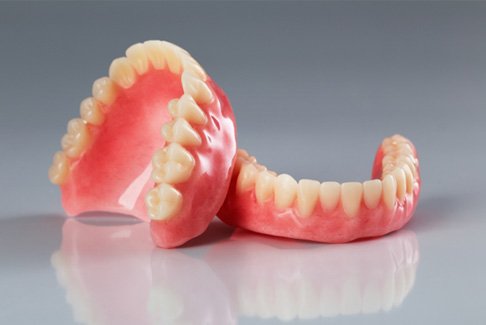 dentures lying on a table