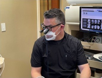dentist working on patient's teeth