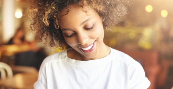 Woman sharing beautiful smile after cosmetic dentistry