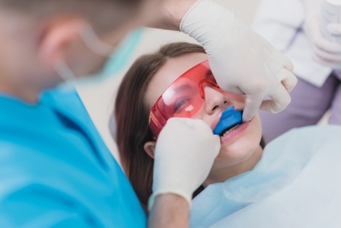 Dental patient receiving fluoride treatment